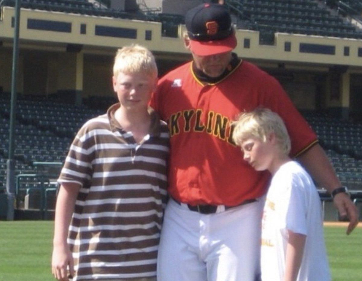 Michael Hoog with his kids at the ballpark
